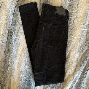 Levi’s 720 high rise super skinny snake skin effect pants